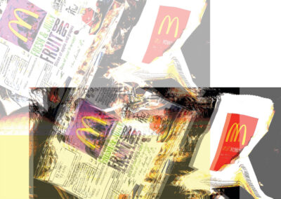 Mcdonalds small chips and fruit bag packaging photographed in a rubbish pile in a bin. This was then edited in with colours and transparency on the compueter. This was to be part of a zine named discarded